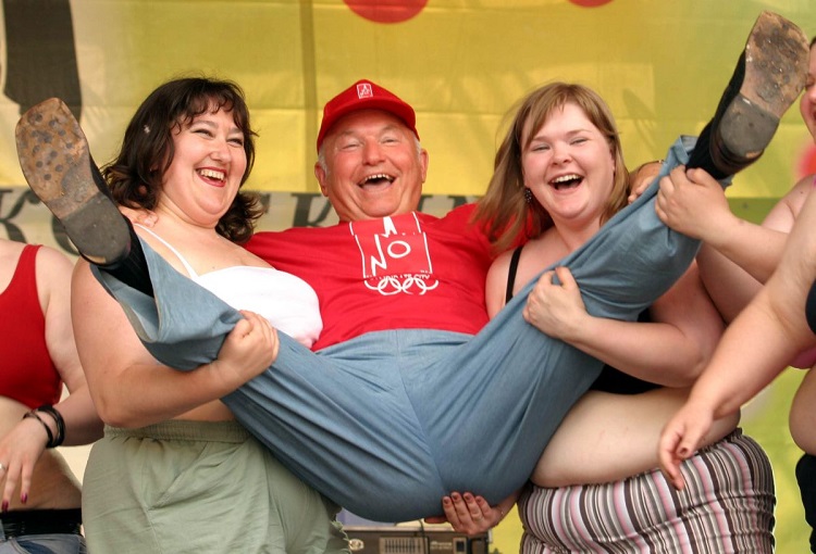 Russian participants of the Fat Beauty Queen contest hold Moscow's Mayor Luzhkov during a festival ...